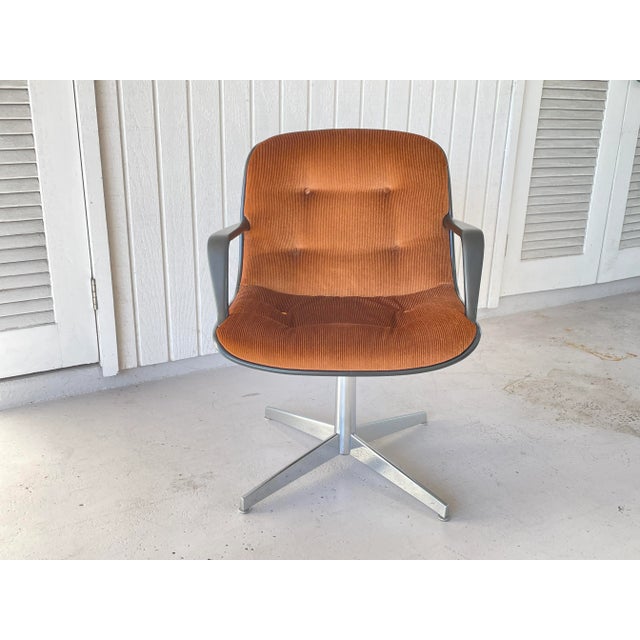 A unique vintage Steelcase armchair, with brown velvet upholstered shell and seat.