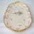 A floral design French porcelain platter. Unknown backstamp, other than the word "France". Retailed and sold by Higgins &...