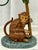 Introducing the charming "Petite Choses Vintage Monkey and Palm Tree Double Candlestick Holder"—a delightful piece that...