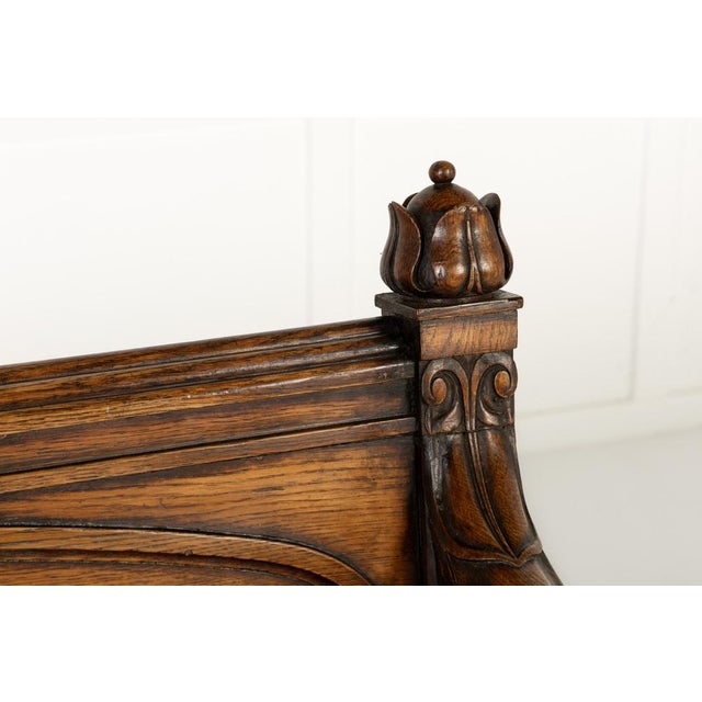 19th century english oak gothic bench a 19th century english oak gothic bench with leather seat. of large and imposing...