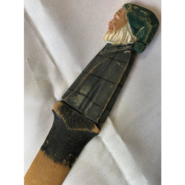 This vintage hand-carved wooden letter opener boasts an older gentleman with a white beard dressed in his night clothes....