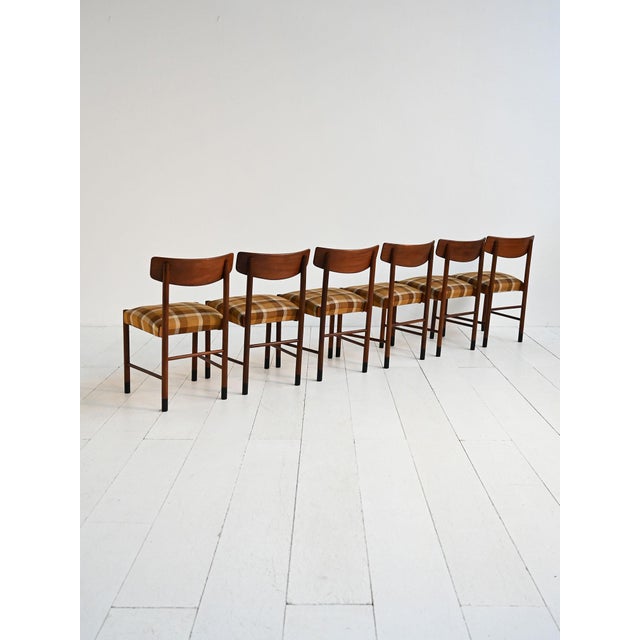 Set of 6 teak chairs with padded seats upholstered in checked fabric. Made by Karl Andersson & Söner, 1960s. A set of six...