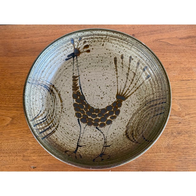 A glazed ceramic bowl with exotic bird decoration. Signed on underside “Prieto”. Antonio Prieto ( 1912-1967 ) was a...