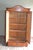 19th century German walnut cabinet. The height is 192 cm. The depth is 110 cm. The width is 54 cm. Shelves behind the...