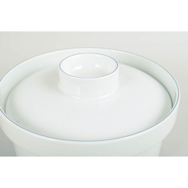 Grethe Meyer for Royal Copenhagen, Blue Line lidded tureen. Lidded tureen model 174 in white faience with a simple blue...