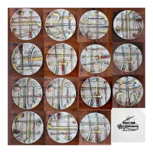 Piero Fornasetti Ceramic Plates Decorated With the Orchestra Pattern. (15 Plates)