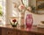 A decorative trio of vases combining rosy color, delicate florals, and contrasting textures. The collection includes a...