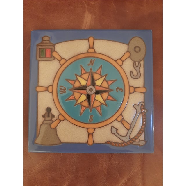 Handcrafted art tile or trivet. Each tile is individually hand-glazed and colored, then kiln-fired to withstand high...