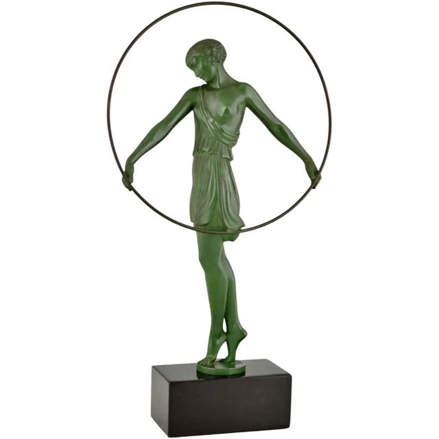 Enrich your collection with this authentic Art Deco sculpture Harmonie, a refined hoop dancer created circa 1930 by Fayral...