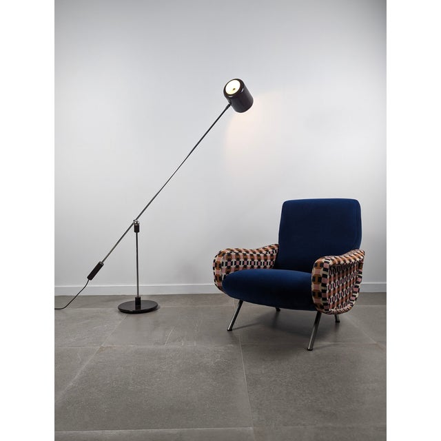 The unique and unusual Magneto floor lamp was designed by Gilbert Watrous (1918-1991) for the 1951 design competition...