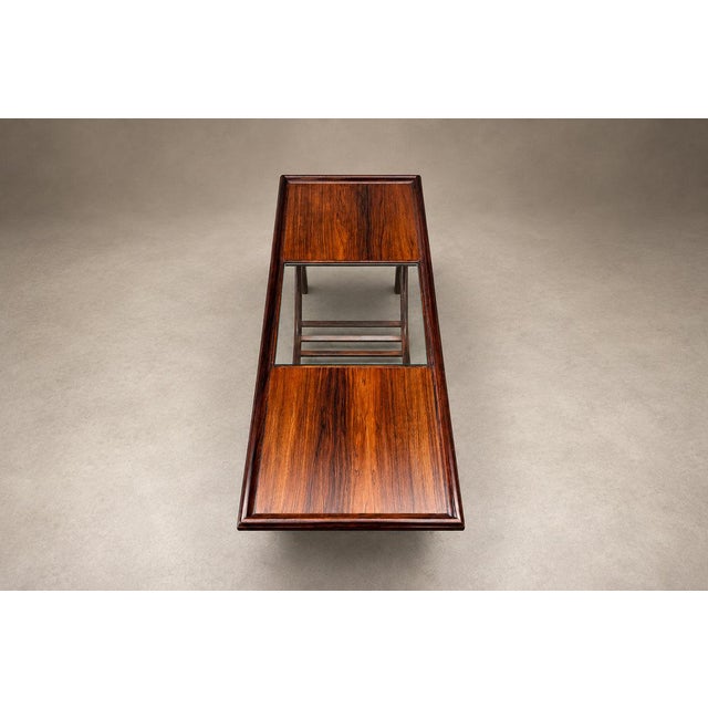 A sculptural Brazilian modern coffee table by Liceu de Artes e Ofícios, crafted in rosewood in the 1960s. The richly...
