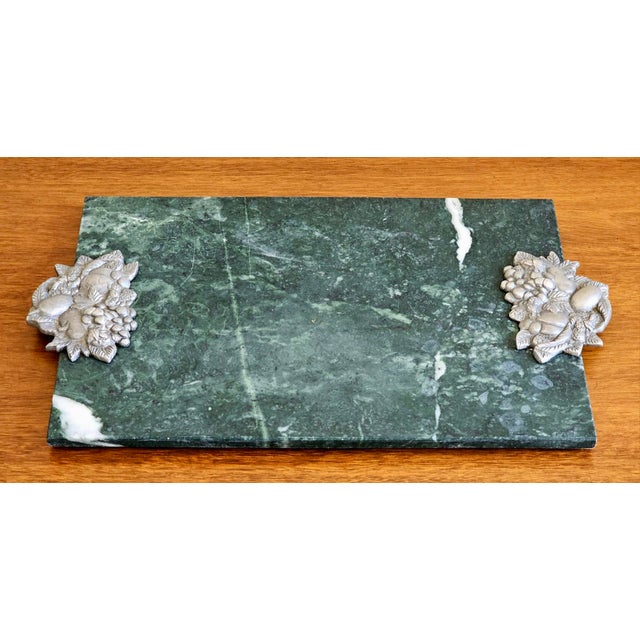This elegant serving board is a classic 1990s piece by Seagull Pewter, a respected Canadian silversmith based in Nova...