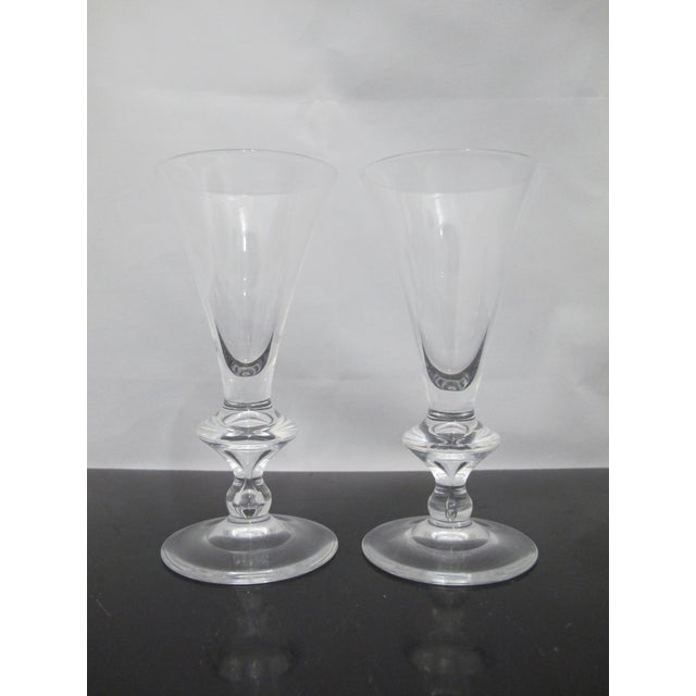 Fine Steuben white wine glass set of 2 in the #7737 pattern. Trumpet shaped bowls with flaring disc on stem, over round...