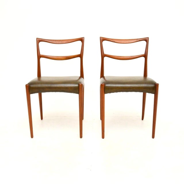A rare and extremely stylish pair of Danish teak and leather chairs by Henry Klein for Bramin. They were made in Denmark,...
