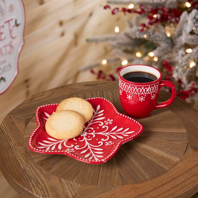 Bring sweet holiday charm to your table with this Red Snowflake Ceramic Plate Set. Designed in the shape of a cozy...