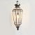 Bronzed metal work pendant lamp with beveled glass panels. Includes 3’ hanging chain and black ceiling plate. 100 watt max...