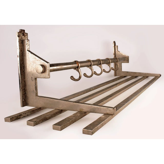 Early 20th century Art Déco french metal brass wall coat hanger/rack designed by La Maison Desny By: La Maison Desny...