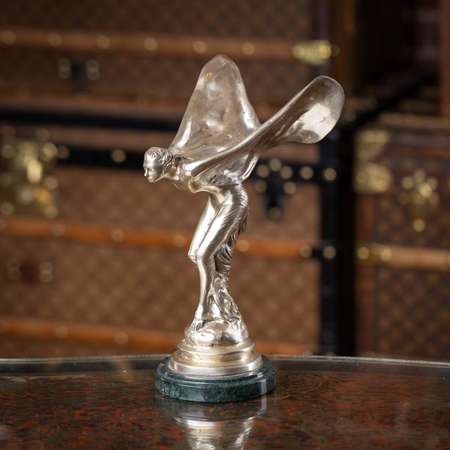 A 20th Century English silver plated model of the legendary Rolls-Royce mascot which was designed by Charles Sykes, this...