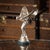 A 20th Century English silver plated model of the legendary Rolls-Royce mascot which was designed by Charles Sykes, this...