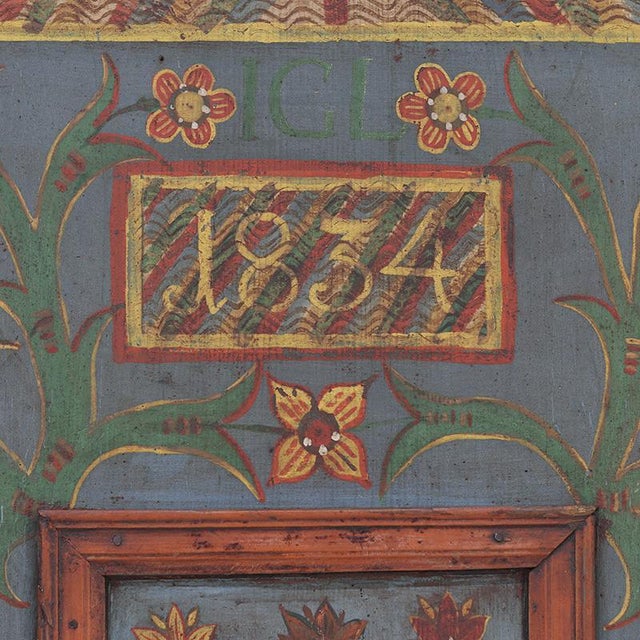 Antique bridal cabinet from 1834, originating from Franconia in Southern Germany. The heavy, weathered character and the...