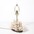 This Mid-Century Modernist table lamp, crafted in the Philippines during the 20th century, skillfully combines organic...