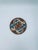 A dessert plate produced in Japan between the 1930s and 1950s in the opulent Satsuma, Kutania style, made of high-quality,...
