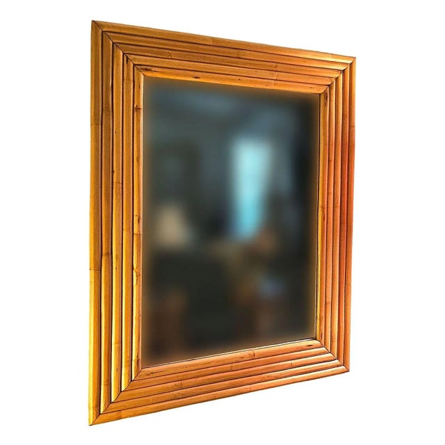 This beautifully restored 1948 new-stock rattan frame from the unused stock of Tropical Sun Rattan Company of Pasadena...