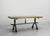 French coffee table from the 1960s made of solid wood and wrought iron French coffee table made in the 1960s, combining a...