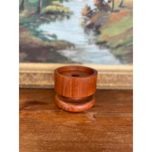 This vintage teak wood piece by Kalmar, made in Thailand, showcases a sculptural modernist form with rich grain and a...