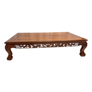 Mid-20th Century Chinese Low Table With Carved Dragons and Phoenix Motifs – Attributed Rosewood For Sale