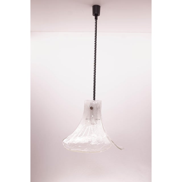 A high quality murano glass chandelier from kalmar. Three flower petal shaped glass plate. The glass was hand made in...