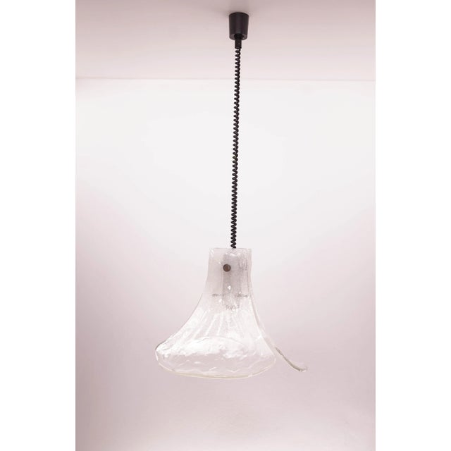A high quality murano glass chandelier from kalmar. Three flower petal shaped glass plate. The glass was hand made in...
