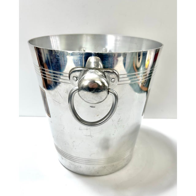 A wonderful, unique champagne ice bucket from 1950s France. The lettering is amazing - it’s so perfectly understated and...