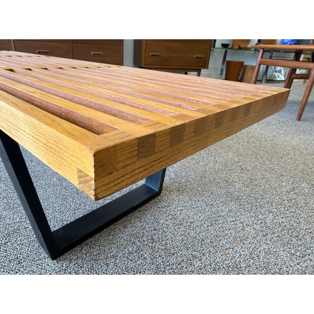 Mid century modern slat bench / coffee table designed by George Nelson. This MCM staple serves as a highly versatile...