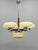 Elegant art deco chandelier produced in czechoslovakia during the 1930s, combining refined functionalist design with...