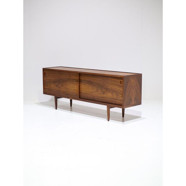 Stylish sideboard model 20 designed by Niels Otto Møller for J.L. Møllers Møbelfabrik in Denmark, 1960s. This sideboard is...