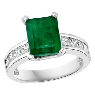 3.5 Carat Emerald Cut Emerald and 0.5 Carat Diamond Ring 14 Karat White Gold For Sale