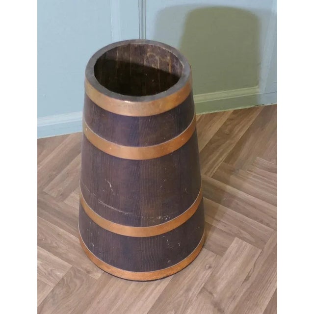 Copper and Oak Barrel Stick Stand This good looking piece is cone shaped and heavy at the bottom so very sturdy, it is...