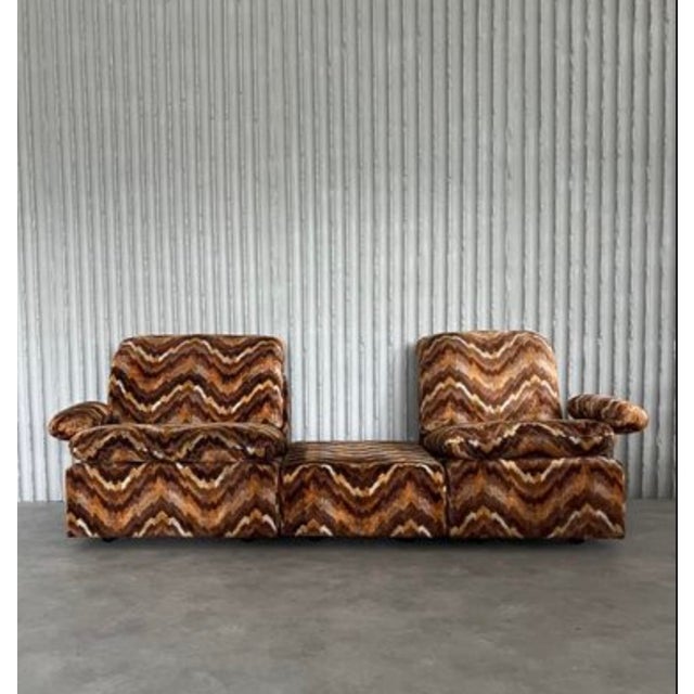 Designer unknown italy 1970s sofa h 78cm w 160cm d 81cm ottoman h 31cm w 60 cm d 81 cm dive into the vibrant, textural...