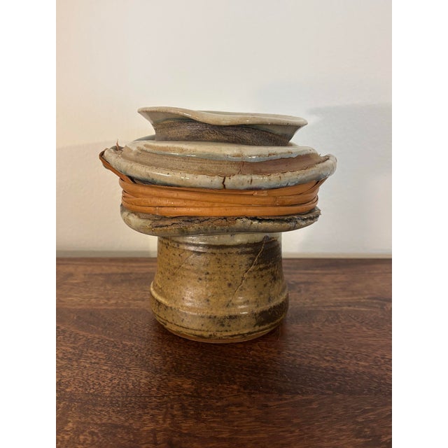 A refined and sculpturally expressive ceramic vase by California studio ceramicist F. Carlton Ball, signed Carlton on the...