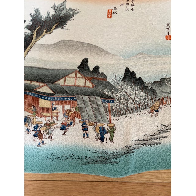 The scene is a reproduction of a famous ukiyo-e woodblock print by the legendary artist Utagawa Hiroshige. Authentic...