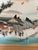 The scene is a reproduction of a famous ukiyo-e woodblock print by the legendary artist Utagawa Hiroshige. Authentic...
