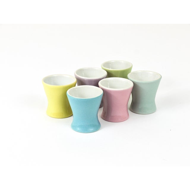 A set of six charming egg cups from the "Daisy“-series, made of china in six different lovely pastel colors, yellow, light...