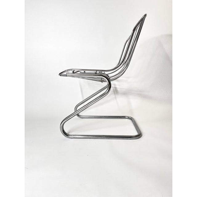 The metal chairs are in perfect condition. One pillow is in a good condition, one in a bit ruined on the back of the seat...