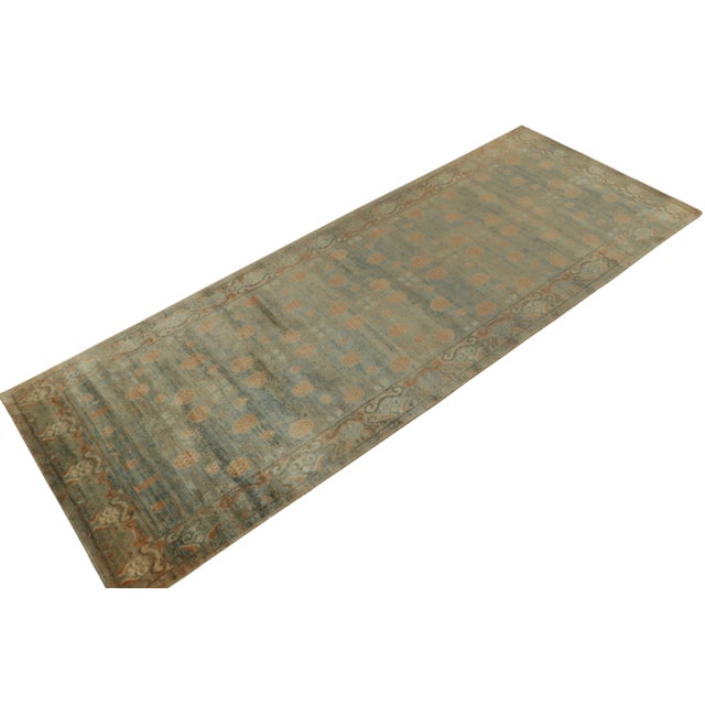 Hand-knotted in fine silk, a gorgeous rug inspired by 20th century antique Khotan-Samarkand rugs of the 1920s. New to our...