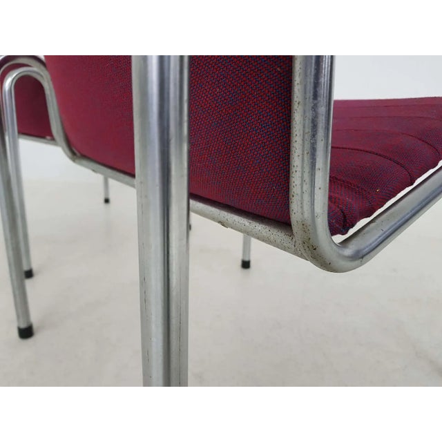 Kho Liang Ie for Stabin lounge chairs model 703, Holland 1960s. Tubular metal frame and original bordeaux – red...