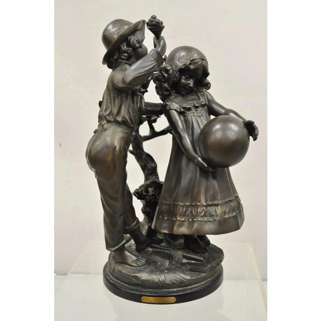 "Enjoue" after Auguste Moreau Victorian Style Bronze Boy and Girl Statue Sculpture. Circa Late 20th Century. Measurements:...