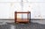 Wooden trolley with two removable trays and brass wheels. Designer: Dino Cavalli Manufacturer: Tredici 1960s This piece is...