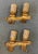 A pair of Spanish mid-century gilt hand hammered iron brutalist electric wall sconces with multi-colored reticulated glass...