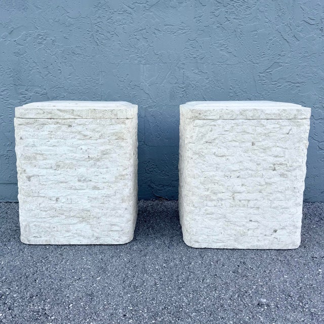 Interior space: 14”w, 14”h Sculptural postmodern side tables crafted in tessellated stone with a softly textured, ivory-...